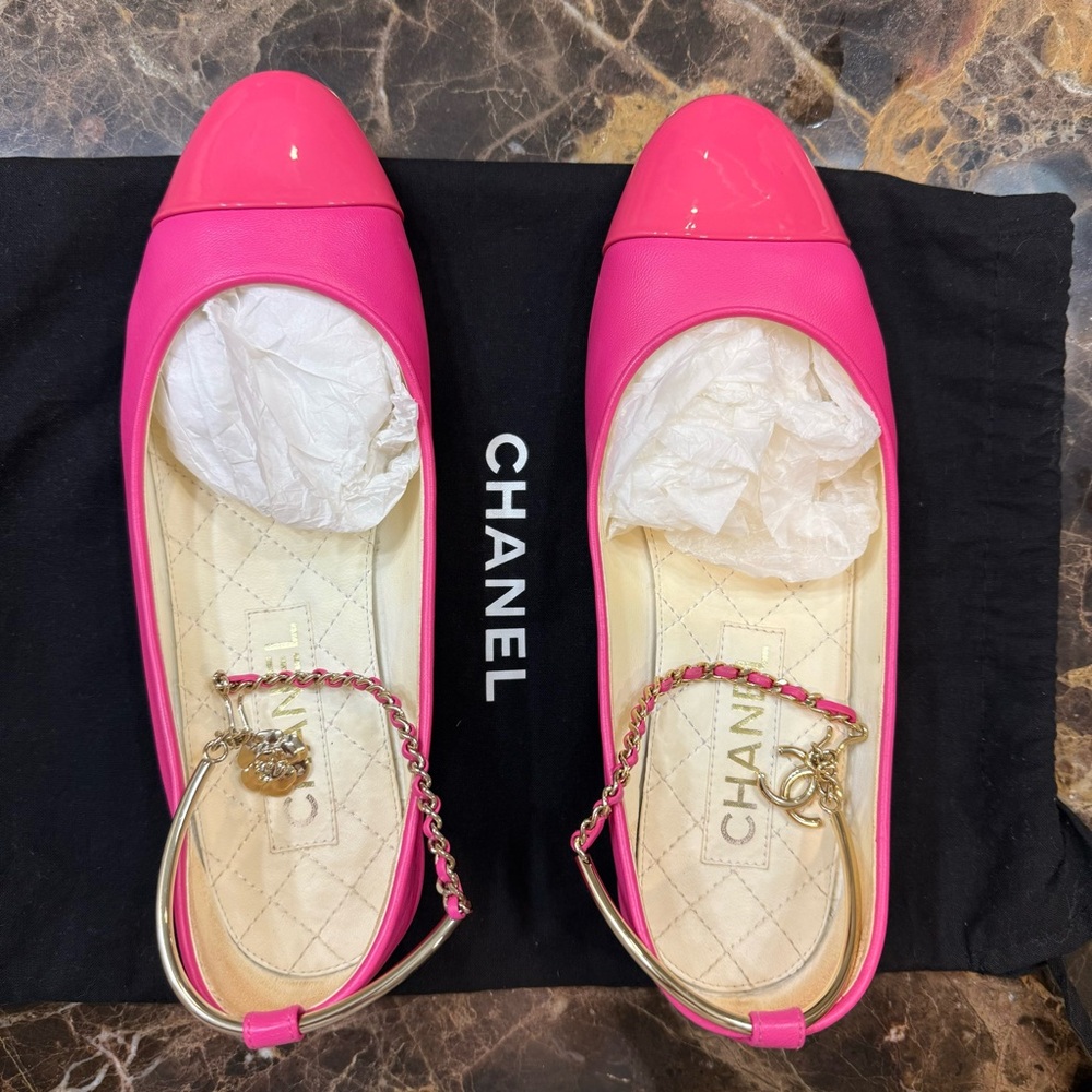 Authentic Chanel ballerina pumps in hot pink lambskin.